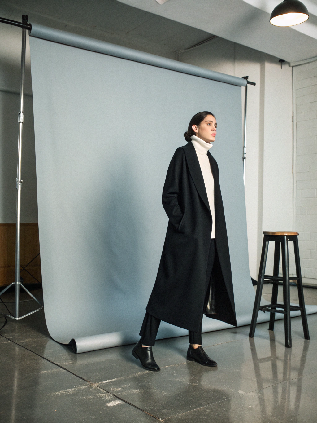 High-fashion editorial portrait with soft lighting