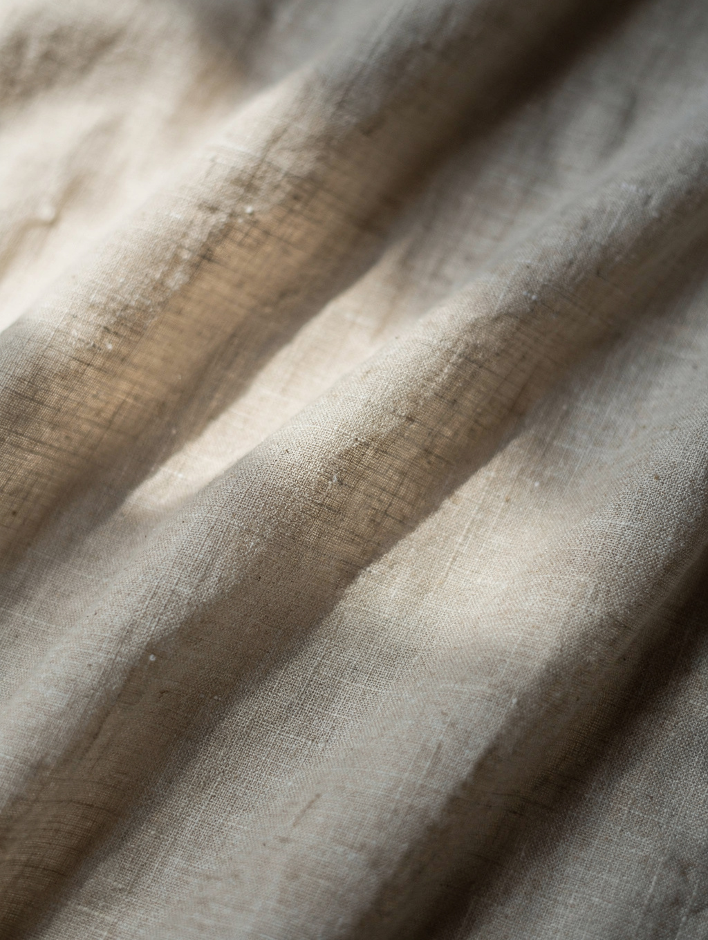 Abstract textured fabric in warm light